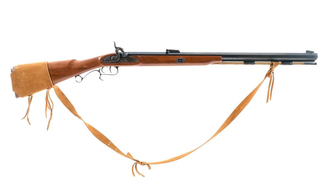 Thompson Center .56 Smooth Bore Musket: Description Thompson Center Arms in .56 Smooth Bore with a 26" octagonal barrel. Metal butt plate. Smooth wood stock and front forend. Blued trigger guard, untextured double set trigger and barrel. Ca