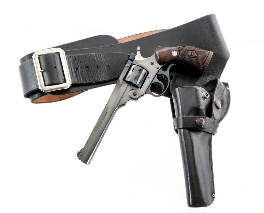H&R Sportsman DA .22 LR Revolver: Description Harrington & Richardson Sportsman Double Action in .22 Long Rifle with a nine round capacity and a 6" barrel. Checkered wood grip plates. Blued trigger guard, serrated trigger, frame, serr