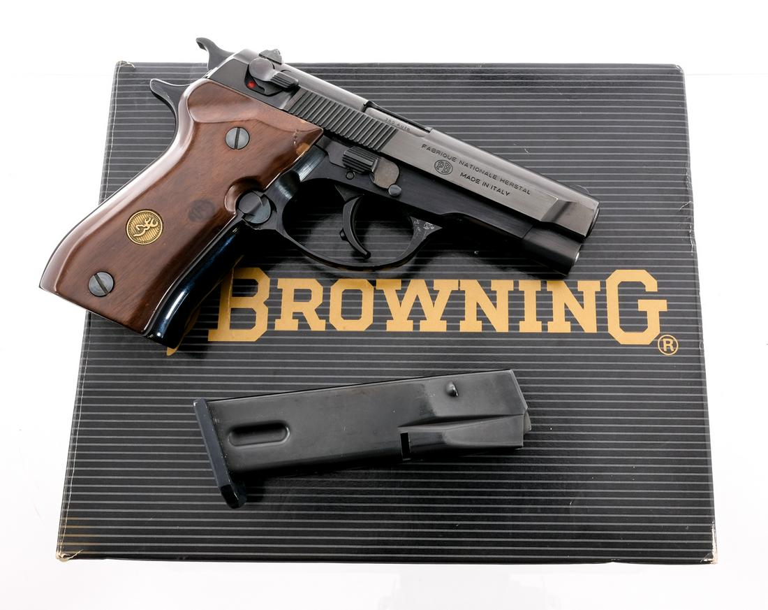 Browning BDA .380 Semi Auto Pistol: Description Browning model BDA in .9mm short (.380) with one thirteen round removable magazine and a 3 3/4" barrel. Made in Italy. Solid wood smooth grip plates. Blued metal frame, barrel and slide. A