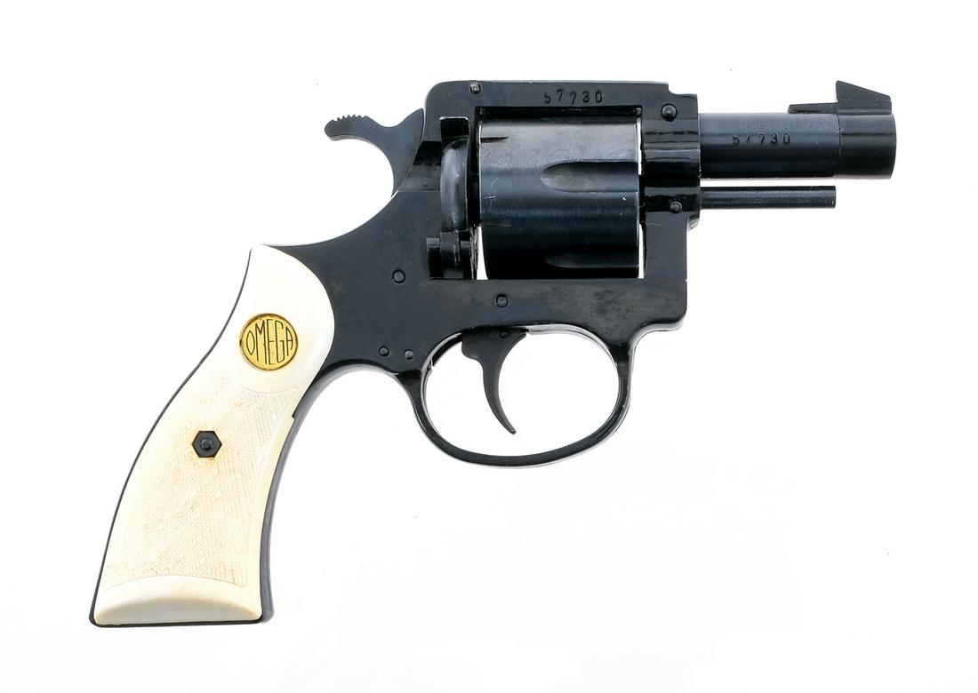 Omega M-32 .32 S&W Long Revolver: Description Omega Model 32 in .32 Smith & Wesson Long with a six round capacity and a 2" barrel. Made in Germany. Checkered white composite grip plates. Blued frame, untextured trigger, serrated hamme