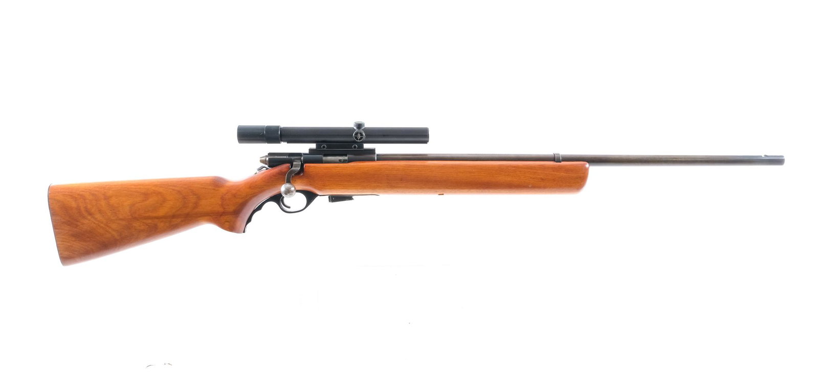 Mossberg 44 .22 LR Bolt Action Rifle: Description Mossberg Model 44 in .22 Long Rifle with one, seven round removable magazine and a 26" barrel. Serrated metal butt plate. Smooth wood stock and front forend. Black composite trigger guard.