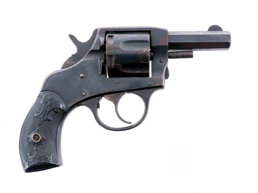 H&R American .32 S&W Revolver: Description Harrington & Richardson The American Double Action in .32 Smith & Wesson with a six round capacity and a 2.5" barrel. Checkered black composite grip plates. Blued frame, untextured trigger