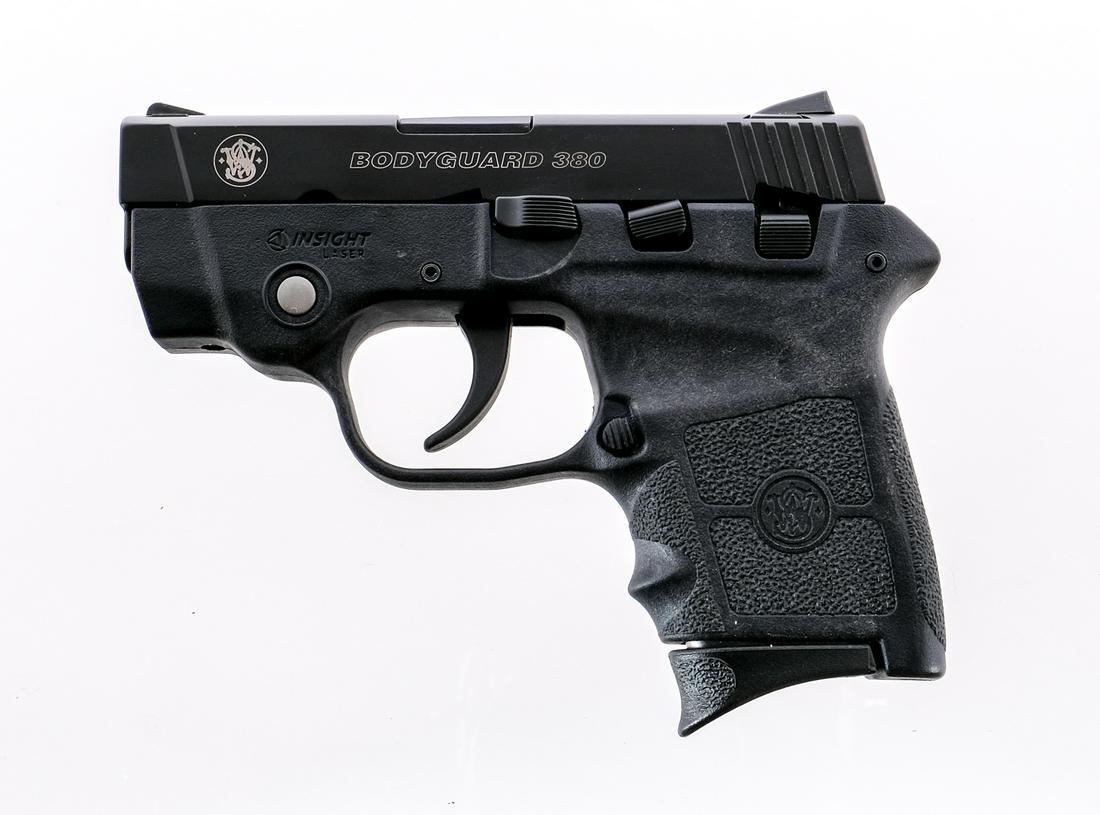 S&W Bodyguard .380 Semi Auto Pistol: Description Smith & Wesson Bodyguard in .380 caliber with one, six round removable magazine and a 2.75" barrel. Textured composite grip on frame. Composite trigger. Blued serrated metal slide and barr