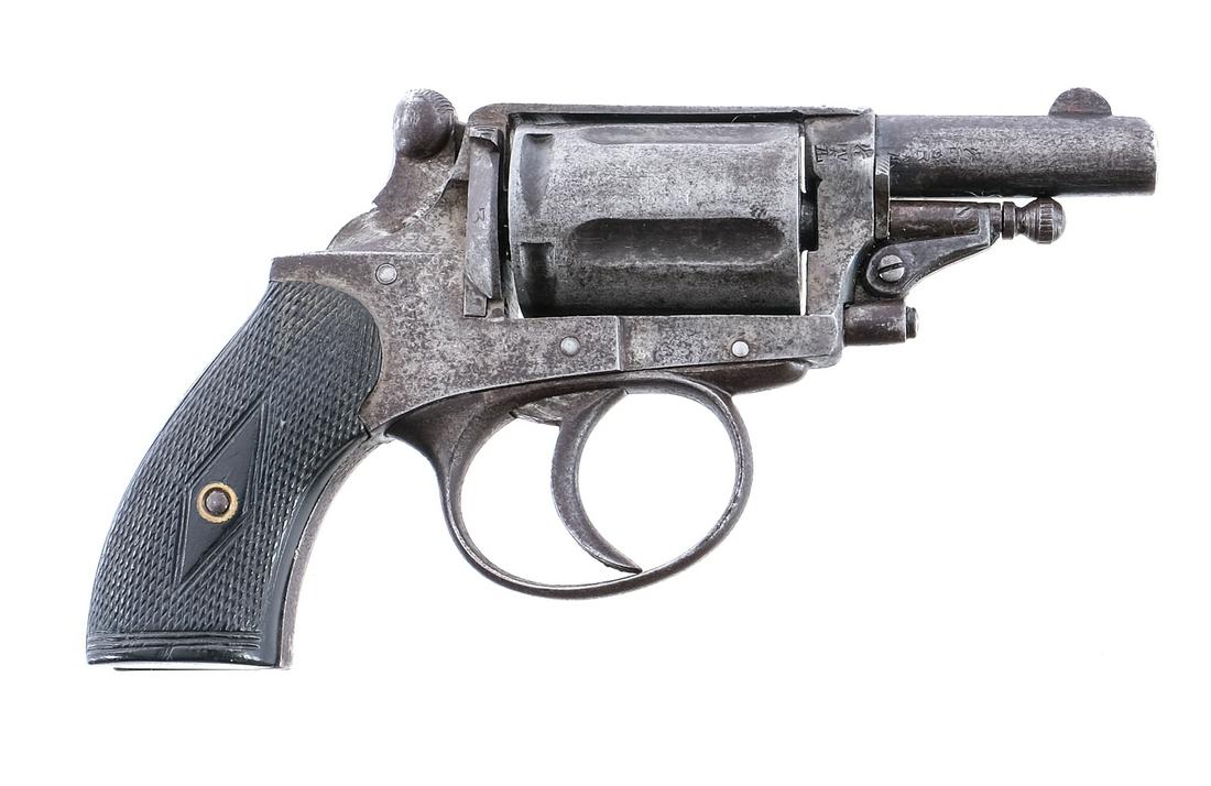 Belgian 5.5mm Velo Dog Revolver: Description Belgian revolver in 5.5mm Velo-Dog with a five round capacity and a 1.75" barrel. Checkered wood grip plates. Metal trigger guard, untextured trigger, serrated hammer, cylinder and barrel.