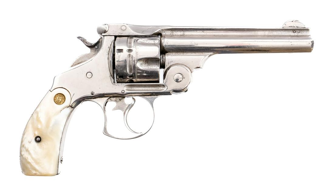 S&W DA Favorite .44 S&W Russian Top Break Revolver: Description Smith & Wesson Double Action Wesson Favorite in .44 Smith & Wesson Russian with a six round capacity and a 5" top fluted barrel. S&W Mother Of Pearl grip plates. Nickel plated frame, cylin