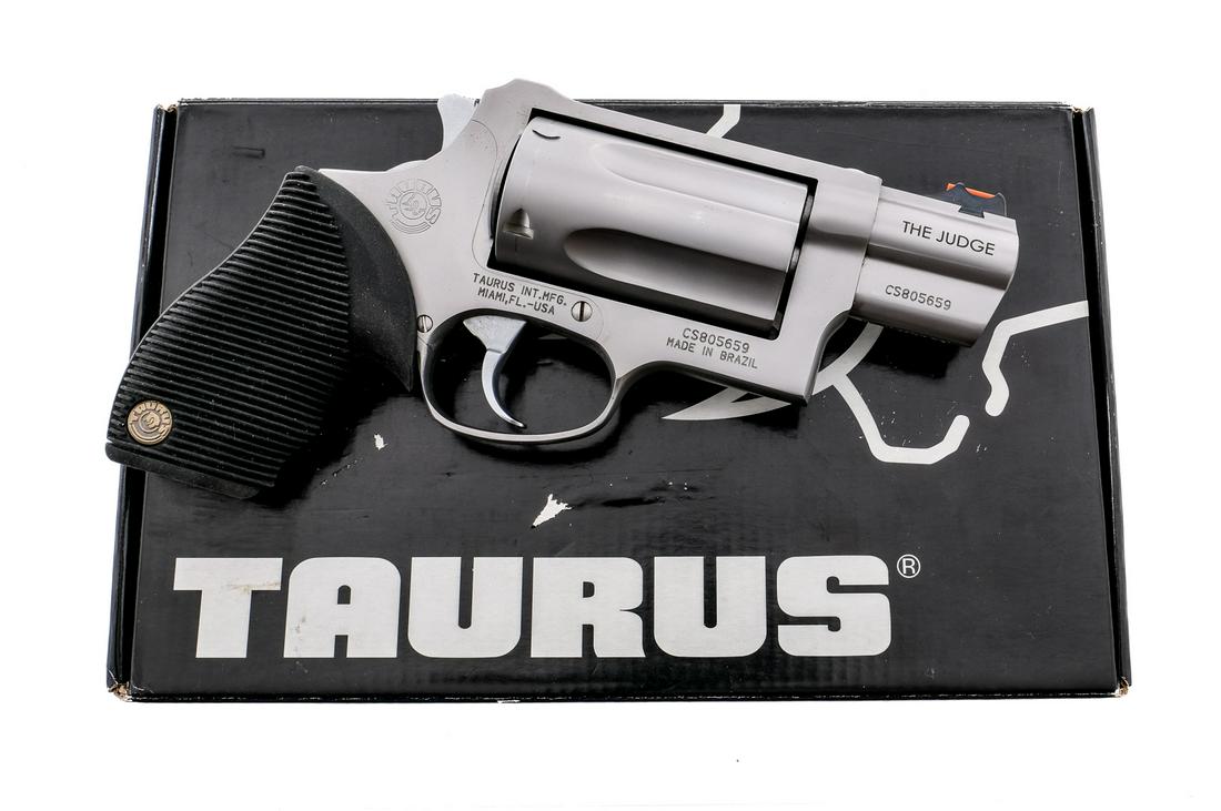 Taurus Judge PD .45 Colt/.410 Revolver: Description Taurus Judge Public Defender chambered in .45 Colt and .410 gauge with a five-shot capacity and a 2" barrel. Made in Brazil and imported by Taurus INT.MFG. Miami, FL-USA. Stainless frame, 