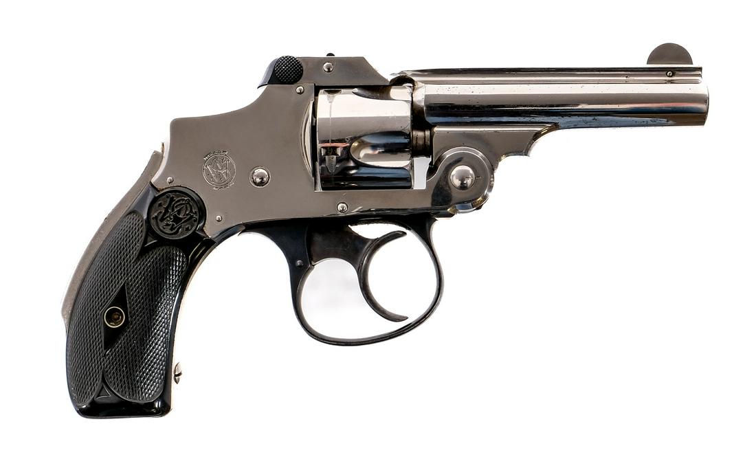 S&W Safety Hammerless .32 S&W Revolver: Description Smith & Wesson Safety Hammerless 2nd Model in .32 S&W with a five round capacity and a 3" barrel. Checkered composite grip plates. Nickel plated frame, cylinder and barrel. Blued trigger g