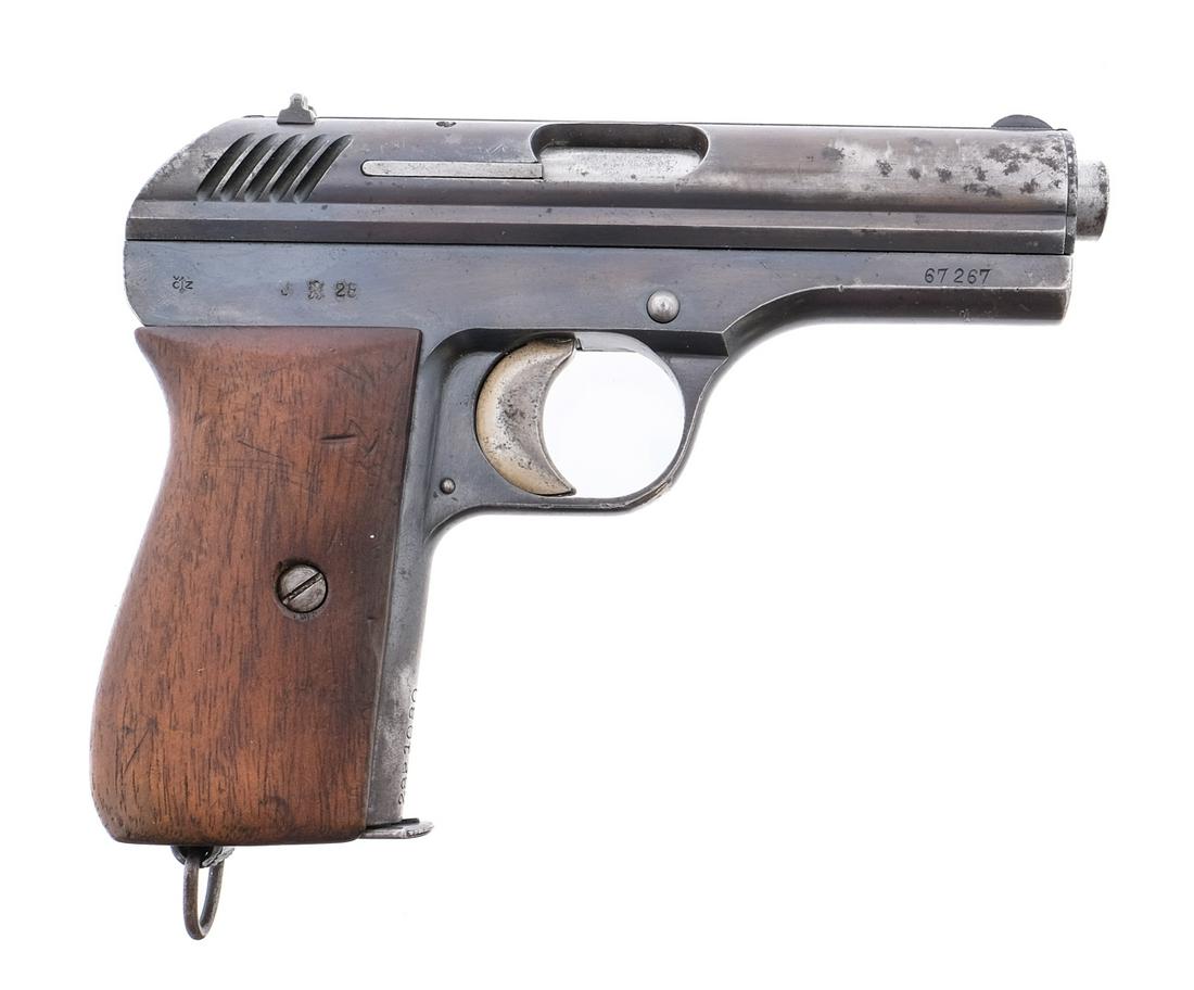 CZ 27 .32 Semi Auto Pistol: Description CZ Model 27 in 7.65mm (.32 ACP) with one, nine round removable magazine and a 3.5" barrel. Smooth wood grips. Blued frame and serrated slide. Stainless solid trigger and serrated hammer. L