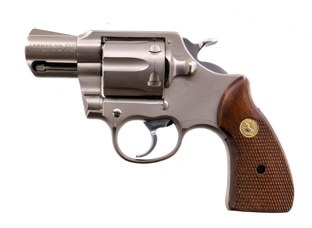 Colt Lawman MK III .357 Mag Revolver: Description Colt Lawman MK III chambered in .357 magnum with a six-shot cylinder and a 2" barrel. Satin nickel finished barrel, frame, and cylinder. Polished stainless trigger and textured hammer. Smo