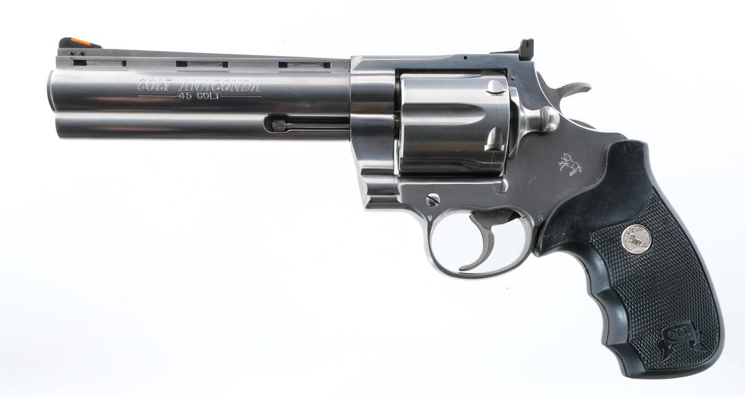 Colt Anaconda .45 LC 1995 Revolver: Description Rare in this caliber, Colt Anaconda in .45 Long Colt with a six round capacity and a 6" top rib vented barrel. Checkered rubber grip plates. Polished stainless steel frame, cylinder and ba