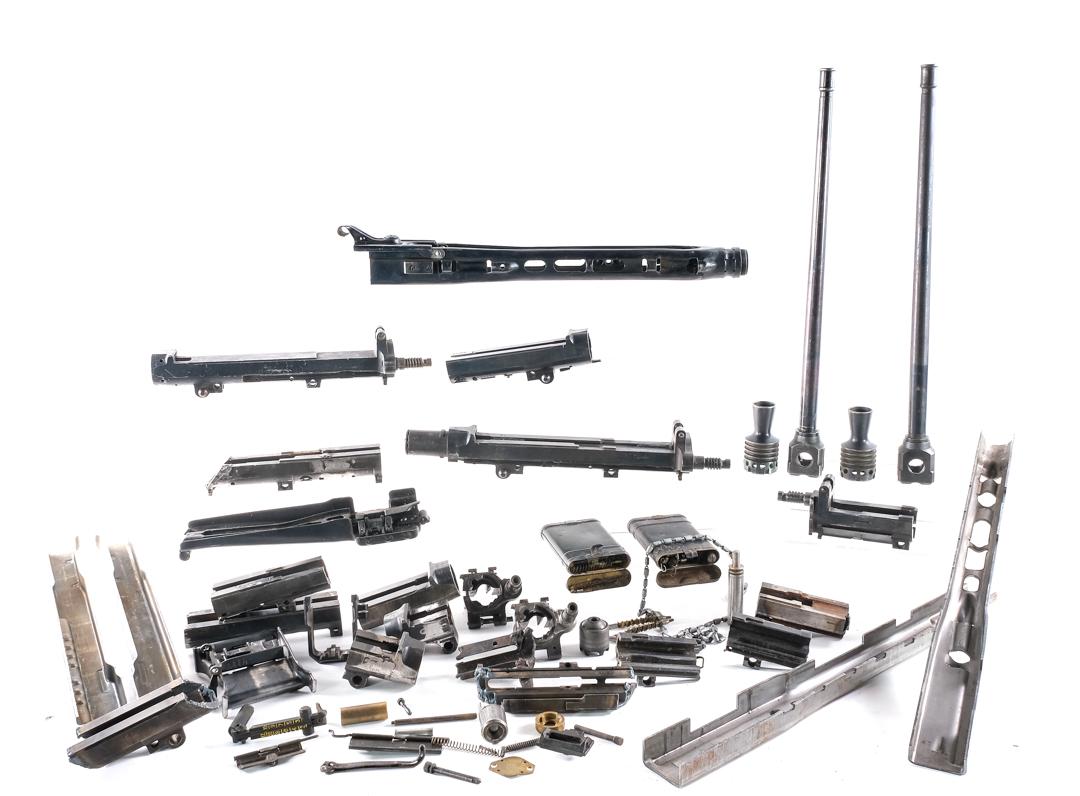 MG42 Demilled Receivers and MG34/42 Parts Lot: Huge lot of MG34 and MG42 parts including several MG34 demilled receivers with cams, top cover, feed trays, booster cones, muzzle devices, WWIIMG42 complete demilled receiver, complete BRP Corp MG42 r