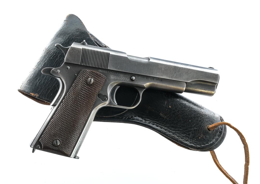 U.S. & S. CO. 1911 A1 .45 Semi Auto Pistol: Description United Switch & Signal Company 1911 A1 in .45 caliber with one, seven round removable magazine and a 4.75" barrel. Checkered brown composite grip plates with a Star K on the back of each w