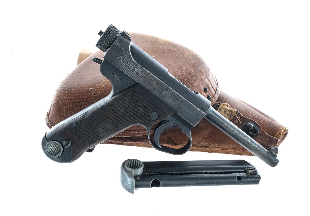Japanese Nambu Type 14 8mm Pistol: Description Japanese Nambu Type 14 Second Series in 8x22mm which is called 8mm Nambu with two, eight round removable magazines and a 4.5" barrel. Made by Nagoya Arsenal in April of 1944. Serrated wood