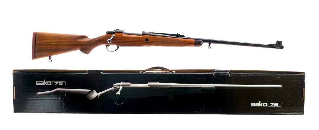 Sako AIV .300 Winchester Magnum Bolt Action Rifle: Description Sako AIV chambered in .300 Winchester Magnum with a internal magazine and a 24" tapered barrel. Blued barrel, receiver, and bolt handle. Stainless bolt and trigger. Checkered walnut Monte 