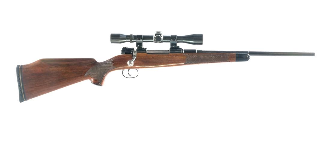Mauser 1895 6.5x55mm Sporterized Bolt Rifle: Description Mauser Model 1895 "Contract Mauser" in 6.5x55mm with a five round capacity and a 18" barrel. Textured hard rubber butt pad. Checkered Monte Carlo Style wood stock and front foregrip. Blued