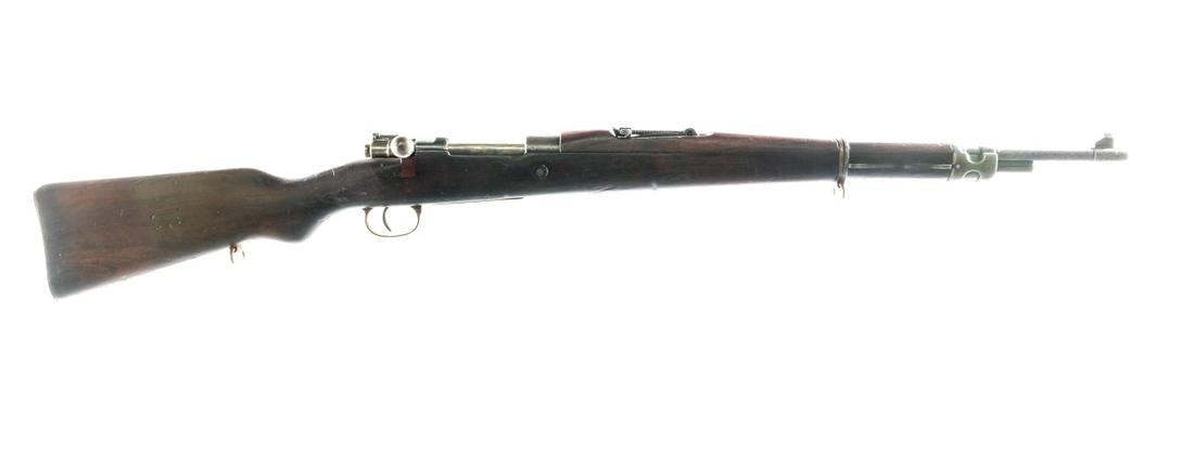 Yugo Mauser M24/47 8mm Bolt Action Rifle: Description Yugoslavian Mauser Model 24/47 in 8mm with a five round capacity and a 23" barrel. Import marked on the front barrel by, C.A.I. Georgia VT. Metal butt plate. Smooth wood stock and front fo