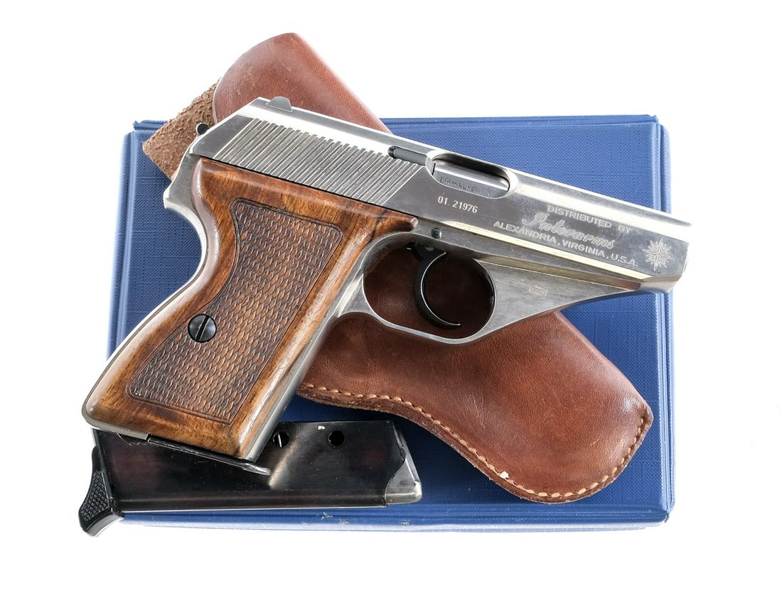 Mauser HSC .380 Semi Auto Pistol: Description Mauser Werke HSC in .380 caliber with two, seven round removable magazines and a 3.25" barrel. Checkered wood grip plates. Nickel finished frame and serrated slide. Blued trigger and serra