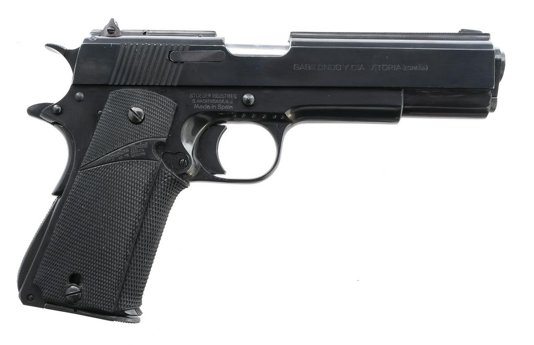 Llama 1911IX-A .45 Semi Auto Pistol: Description Llama 1911 IX-A in .45 caliber with one, seven round removable magazine and a 5" barrel. Made in Spain and import marked by Stoeger Industries. Aftermarket checkered rubber pachmayr grip. 