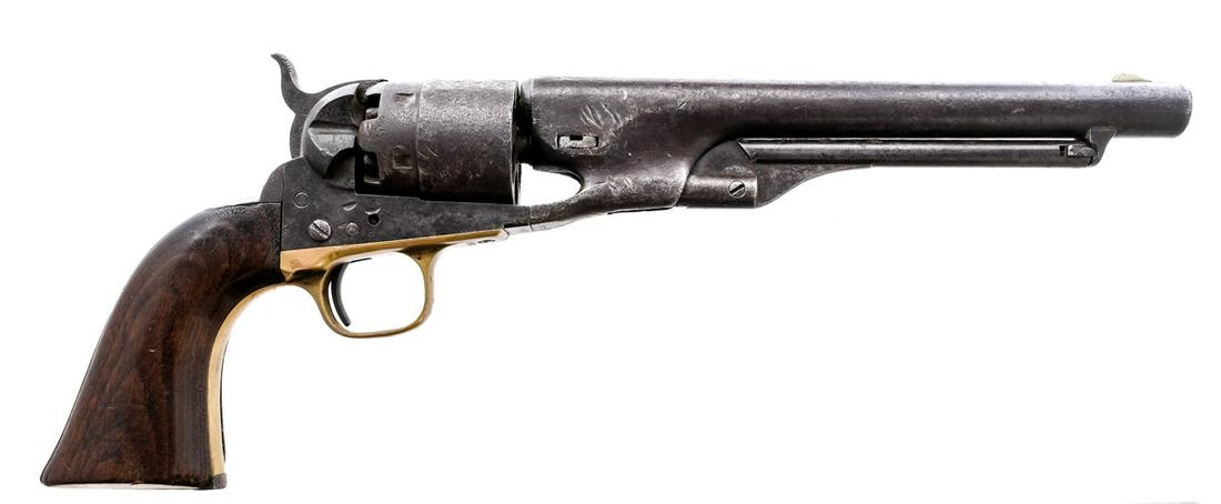 Colt 1860 Army .44 BP Revolver: Description Colt Model 1860 Army in .44 caliber with a six round capacity and a 8" barrel. Smooth wood grip plates. Brass trigger guard and front strap. Blued frame, cylinder and barrel. Under barrel 