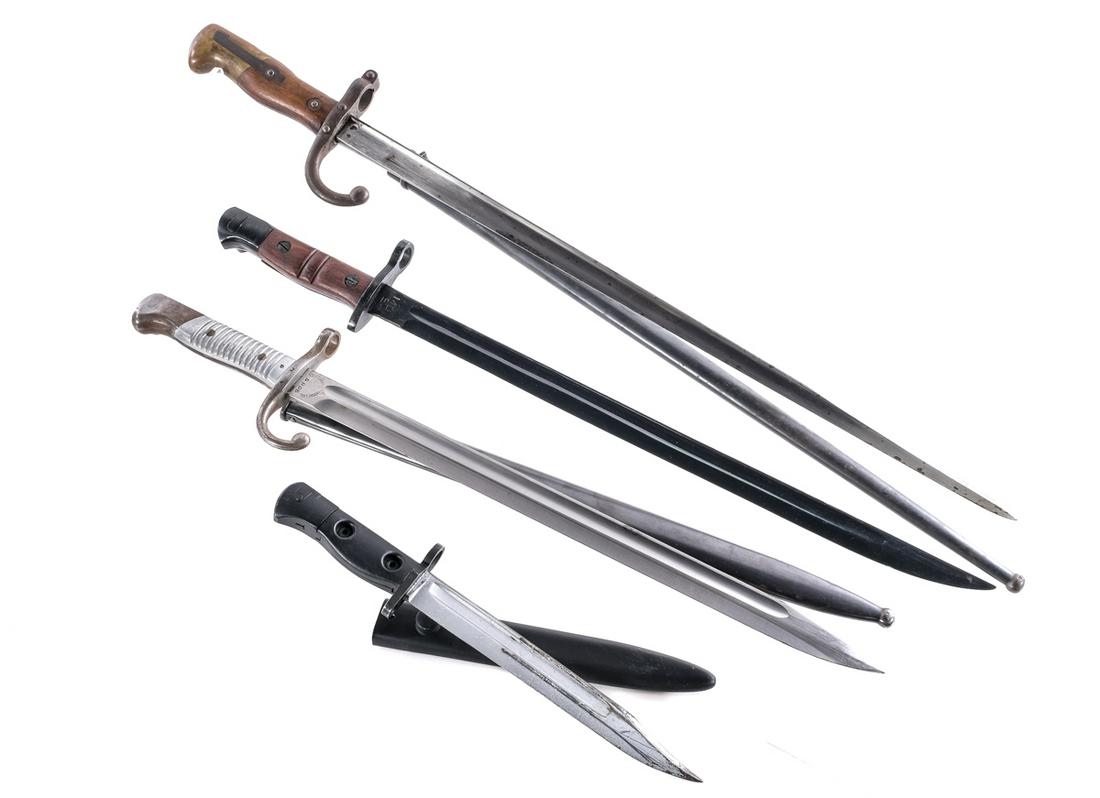 Estate Bayonet Lot 4Pcs Rifle Bayonets: Description This lot is for four assorted rifle bayonets. French Gras bayonet marked 1879 with a 20.5" blade and a 25.5" overall length. Comes in metal scabbard marked: FG 50618. Handguard marked: D83