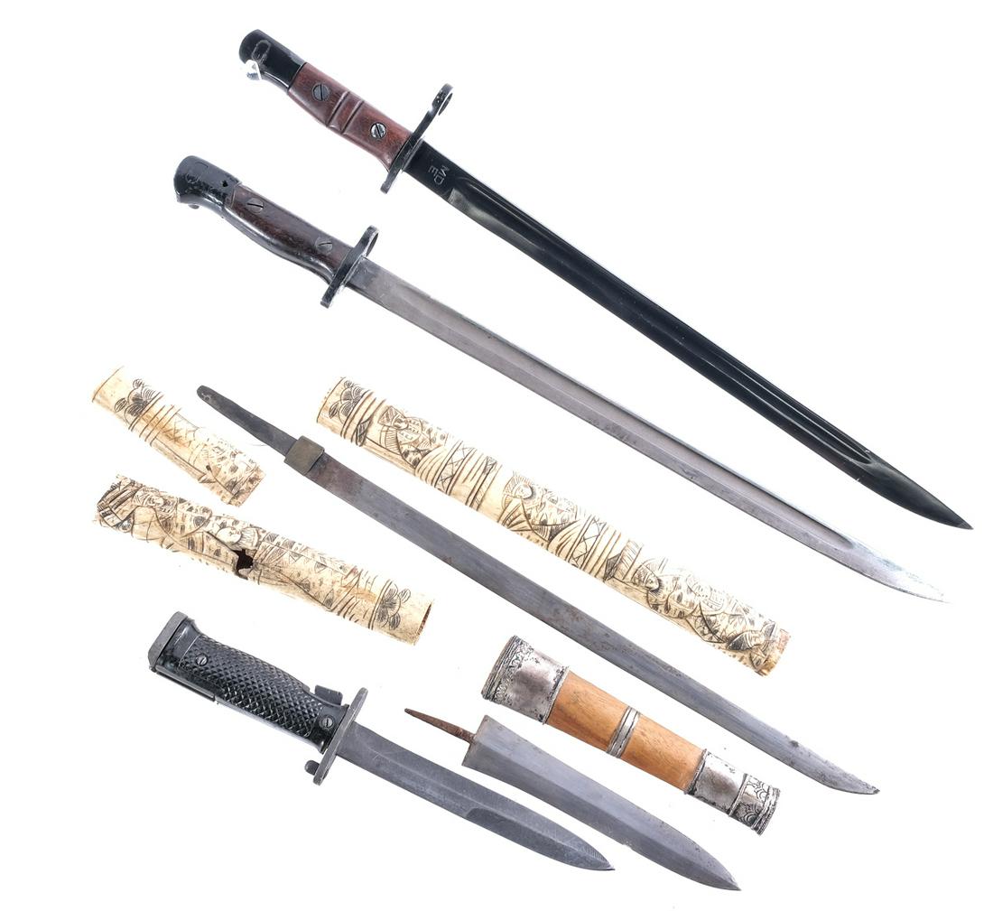 Estate Blade 5 Pcs Lot Knives / Bayonets: Description Estate found mixed blades. Middle Eastern style blade with a 6.75" blade and a 7" wood and silver metal accented sheath. Enfield 1907 bayonet marked Wilkinson with a 17" blade and a 21.5" 