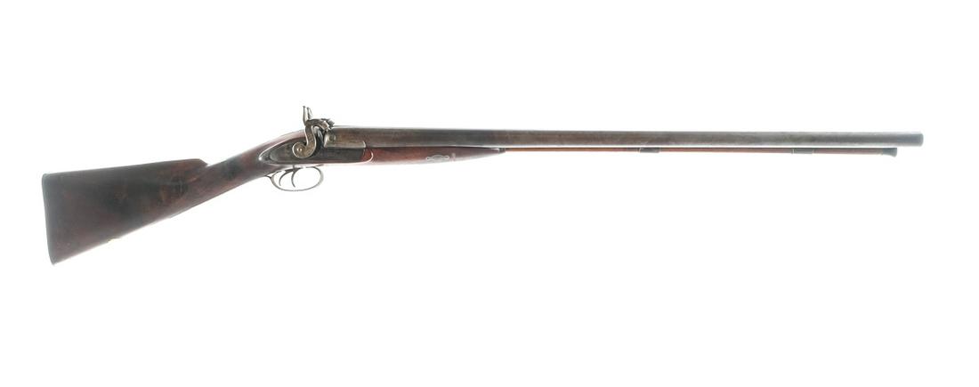 George Fisher 10Ga SxS Black Powder Shotgun: Description George Fisher side by side shotgun in 10 gauge with a two round capacity and a 30" barrel. Muzzle Loading Black Powder shotgun. Smooth metal butt plate. Checkered wood stock and front fore