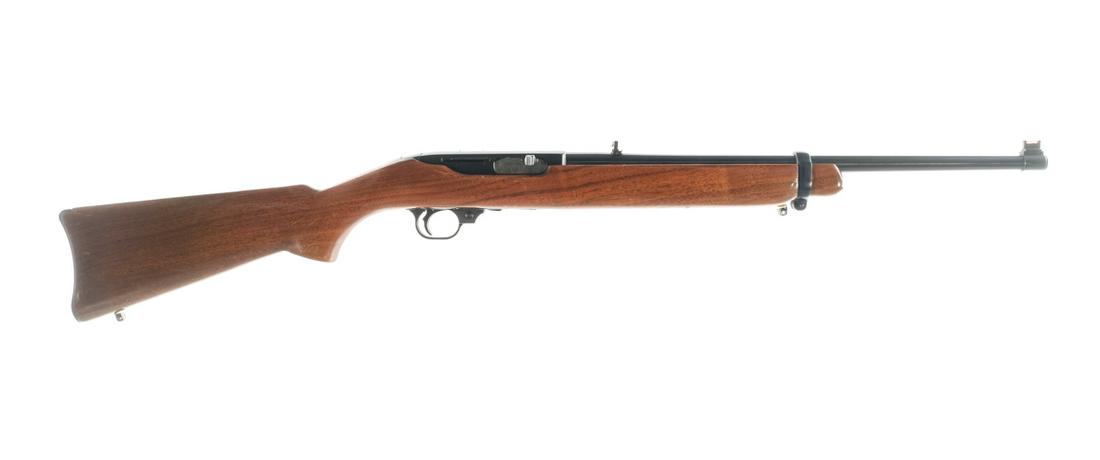 Ruger Carbine .44 Mag Semi Auto Rifle: Description Ruger Carbine in .44 Magnum with a four round capacity and a 18.5" barrel. Blued metal butt plate. Smooth wood stock and front forend. Blued trigger guard, trigger, receiver, charging hand