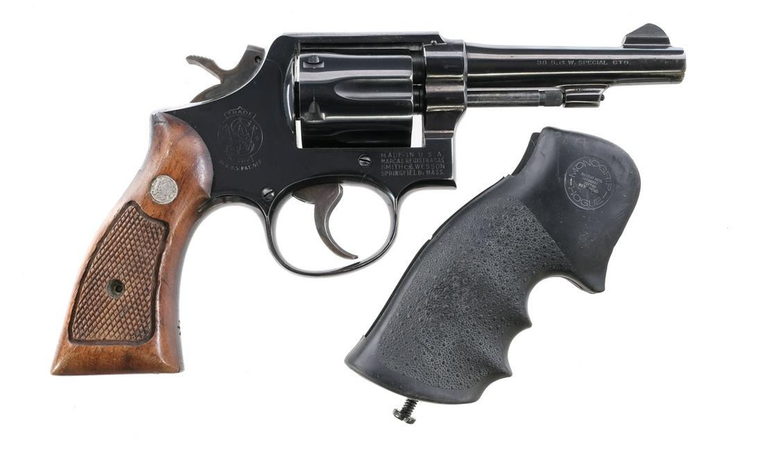S&W 10-5 .38 Spl Revolver: Description Smith & Wesson Model 10-5 in .38 Special with a six round capacity and a 4" barrel. Checkered wood grip plates. Blued frame, cylinder and barrel. Case colored serrated trigger and checkere