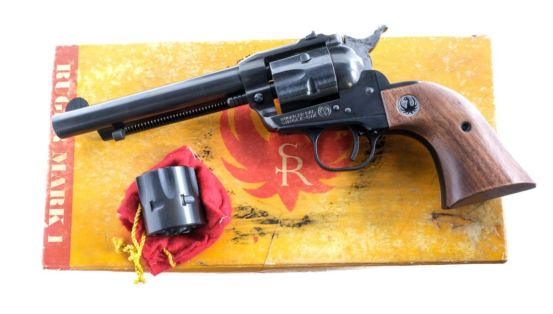 Ruger Single Six .22 1968 Revolver: Description Ruger Single Six in .22 Long Rifle with a six round capacity and a 5.5" barrel. Comes with a extra .22 Magnum cylinder. Smooth wood grip plates. Blued trigger guard, trigger, cylinder, ser
