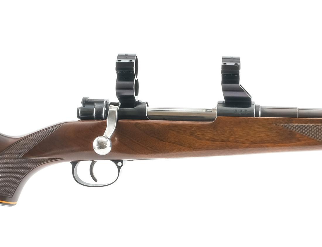 Mauser Gew 98 8mm Bolt Action Rifle: Description Mauser Gew 98 "Sporterized" in 8mm with a five round capacity and a 23.5" barrel. Rubber butt pad. Checkered Monte Carlo style stock and front forend. Blued trigger guard, untextured trigg