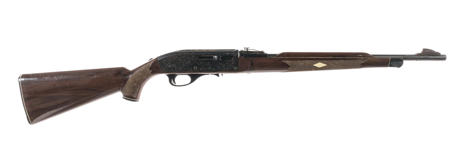 Remington Nylon 66 .22 LR Semi Auto Rifle: Description Remington Nylon 66 in 22 Long Rifle with a fourteen round removable magazine and a 19.5" barrel. Serrated composite butt plate. Checkered composite stock and front foregrip. Composite trig