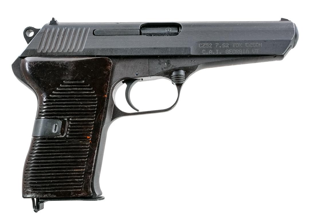 CZ VZ 52 7.62x25 Tokarev Semi Auto Pistol: Description CZ (Ceska Zbrojovka) VZ52 (Model 52) in 7.62x25mm Tokarev with one, eight round removable magazine and a 4.5" barrel. Made in the Czechoslovakia. Import marked on the right front of frame 