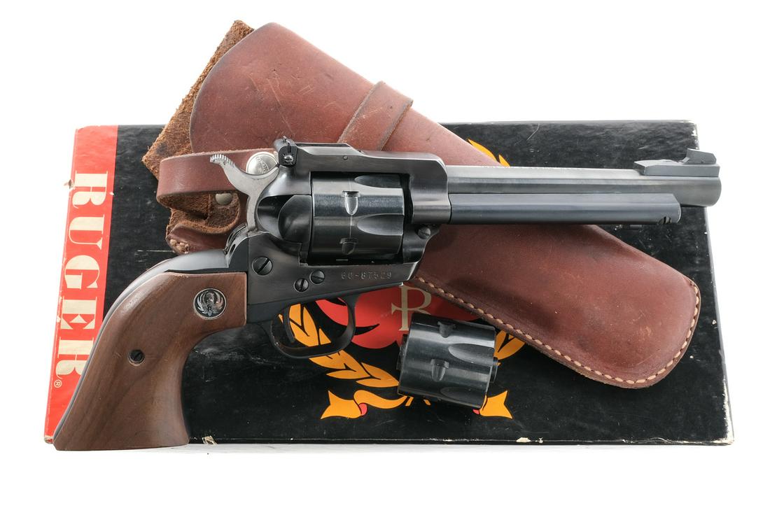 Ruger Single Six .22 LR / WMR Revolver: Description Ruger Single Six (Convertible) in .22 Long Rifle with a extra .22 Winchester Magnum Rimfire (.22 Mag) cylinder both with a six round capacity and a 5.5" barrel. Smooth wood grip plates. Bl