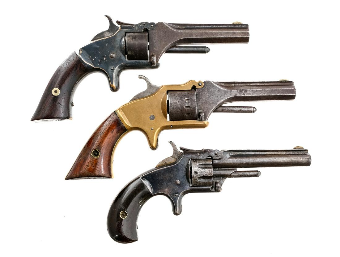 Estate Revolver 3Pcs Lot Antique Revolvers: Description Antique Estate revolver lot with three revolvers. Smith & Wesson Model 1 3rd issue in .22 Rimfire Short with a seven round capacity and a 3.25" barrel. Smooth rosewood grip plates with mat
