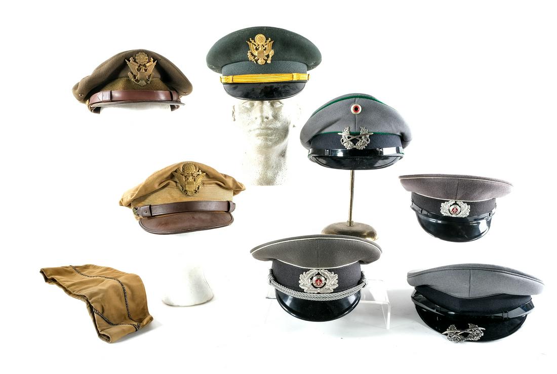 Estate Military Hat Lot 8Pcs Officer Caps: Description Estate Military hat lot of eight assorted pieces. Four East German Officers caps, one marked: NVA 57 1856 N and the other NVA 57 1856 L. Two marked: Bamberger Mutzzen-Industrie Q/B52F/4000
