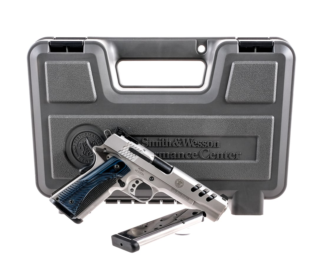 Smith & Wesson PC1911 .45 ACP Semi Auto Pistol: Description Smith & Wesson Performance Center PC1911 chambered in .45 ACP with two, eight round removable magazines and a 5" stainless steel throated barrel with precision crowned muzzle. Stainless st