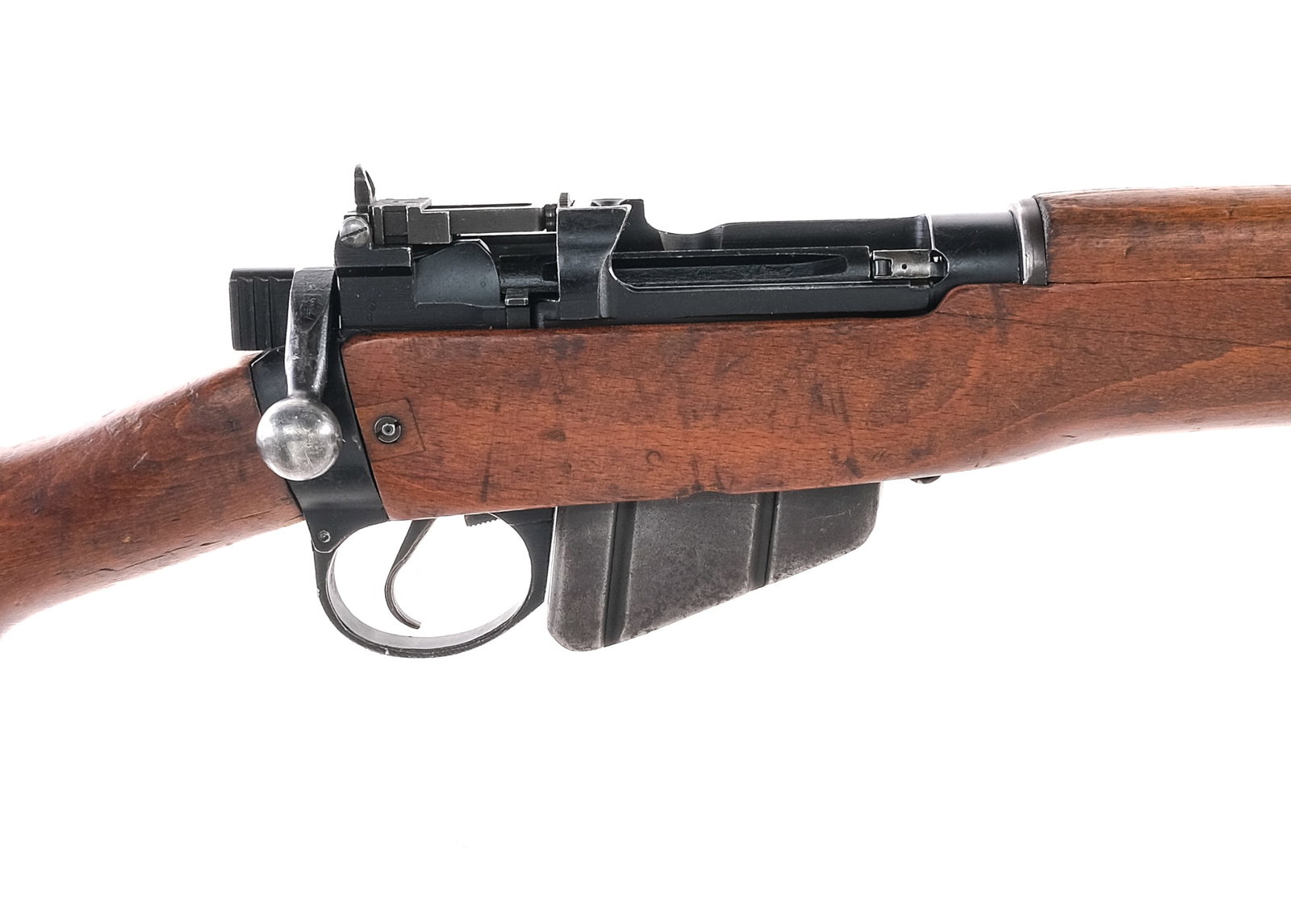 Lee Enfield No.4 Mk2 .303 Bolt Action Rifle: Description Lee Enfield No.4 Mk2 bolt action rifle chambered .303 British with a 25" barrel. Smooth hardwood furniture, brass butt plate with trapdoor. Blued receiver, magazine, trigger, barrel bands,
