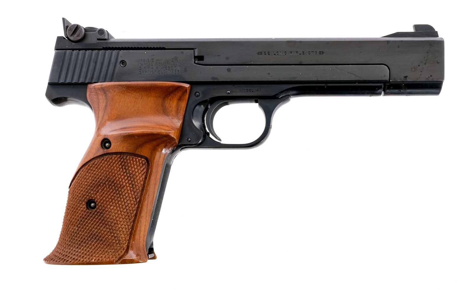 S&W Model 41 .22 LR Semi-Auto Pistol: Description Smith & Wesson model 41 semi-automatic pistol chambered in .22 Long Rifle with one, 10 round magazine and a 5.5" barrel. Checkered wood grip plates. Blued trigger guard, serrated trigger,