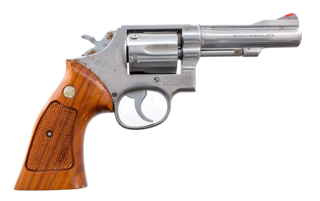 S&W 67-1 .38 S&W Spl Revolver: Description Smith & Wesson Model 67-1 in .38 Smith & Wesson Special with a six round capacity and a 4" barrel. Checkered wood grip plates. Polished stainless steel frame, cylinder and barrel. Serrated