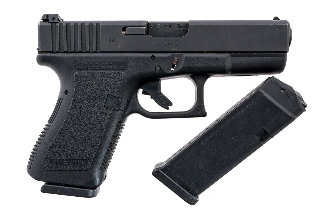 Glock 23 Gen 2 .40 S&W Semi Auto Pistol: Description Glock Model 23 Generation 2 in .40 Smith & Wesson with two, ten round removable magazines and a 4" barrel. Textured composite grip on frame. Serrated composite trigger. Matte blued serrate