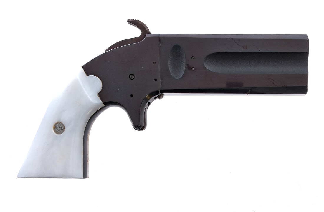 CMC Derringer .32 BP Pistol: Description CMC Derringer in .32 caliber with a two round capacity and a 3.25" over under barrel. White composite grip plates. Blued frame, trigger, serrated hammer and barrel. No fixed sights. Twist 
