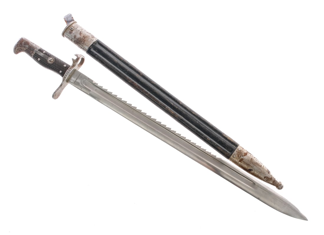 Swiss Vetterli M-1878 Sawback Rifle Bayonet: Description S.J.G. Neuhausen Model 1878 "Four Rivet" sawback bayonet for the Swiss Vetterli rifle. 18.75" sawback steel blade with blood groove on the right side and flat milled on the other. Checkere