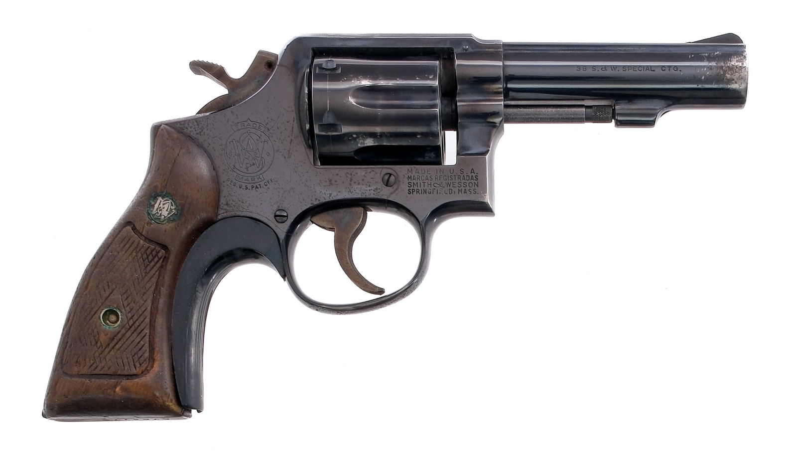 Smith & Wesson 10-6 .38 Spl Revolver: Description Smith & Wesson Model 10-6 in .38 Special with a six round capacity and a 4" barrel. Checkered wood grip plates. Blued frame, cylinder and barrel. Case colored serrated trigger and checkere