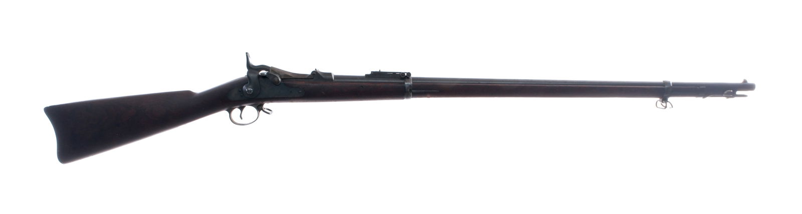 U.S. Springfield 1884 .45-70 Govt Single Rifle: Description U.S. Springfield Model 1884 Trapdoor in .45-70 Government with a single round capacity and a 32.5" barrel. Metal butt plate with cleaning rod door, empty. Smooth wood stock. Blued trigger
