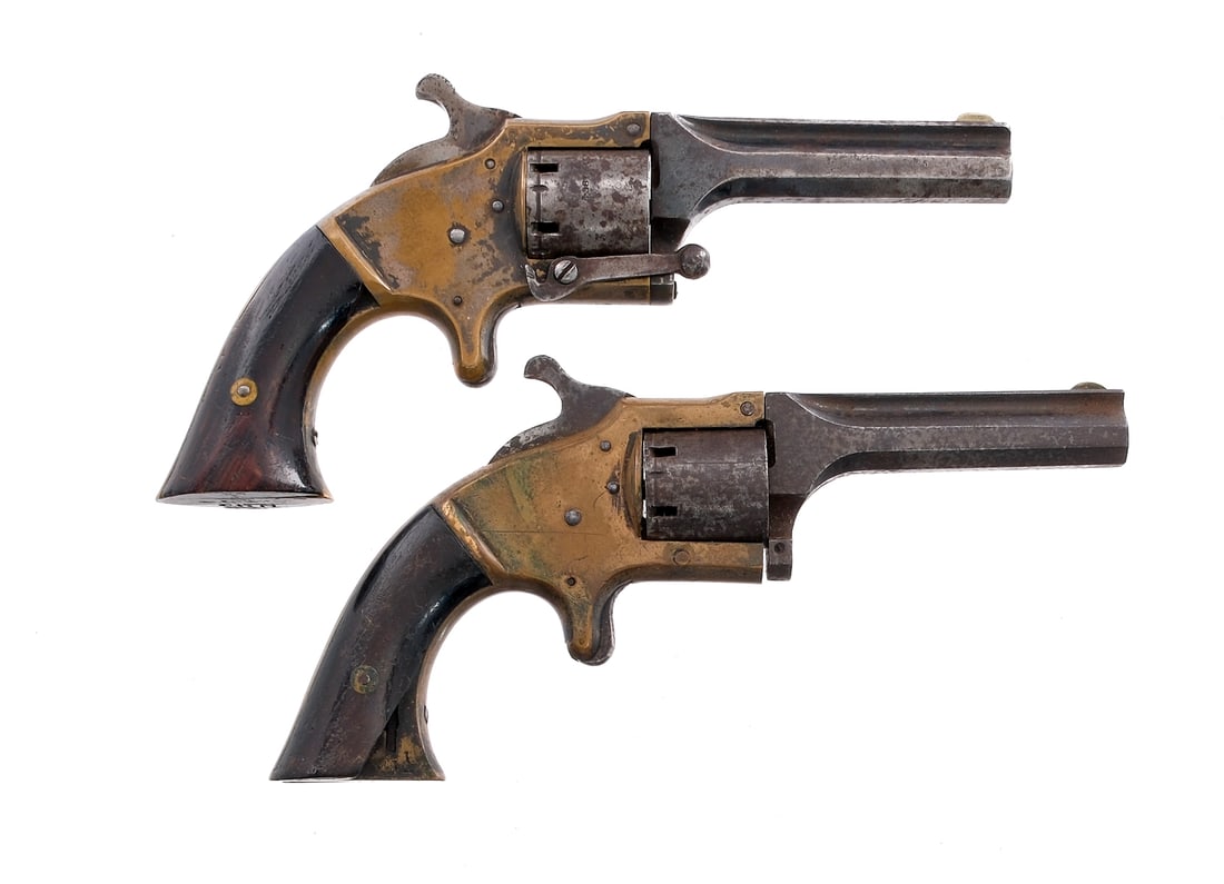 Conn Arms Co .28 Cup Fire Lot 2 Pcs Revolver: Description Connecticut Arms Co lot with two identical pieces in .28 Cup Fire. Six round capacity and a 3" octagon barrel. Smooth wood grip plates. Brass frames. Finish worn triggers, checkered hammer