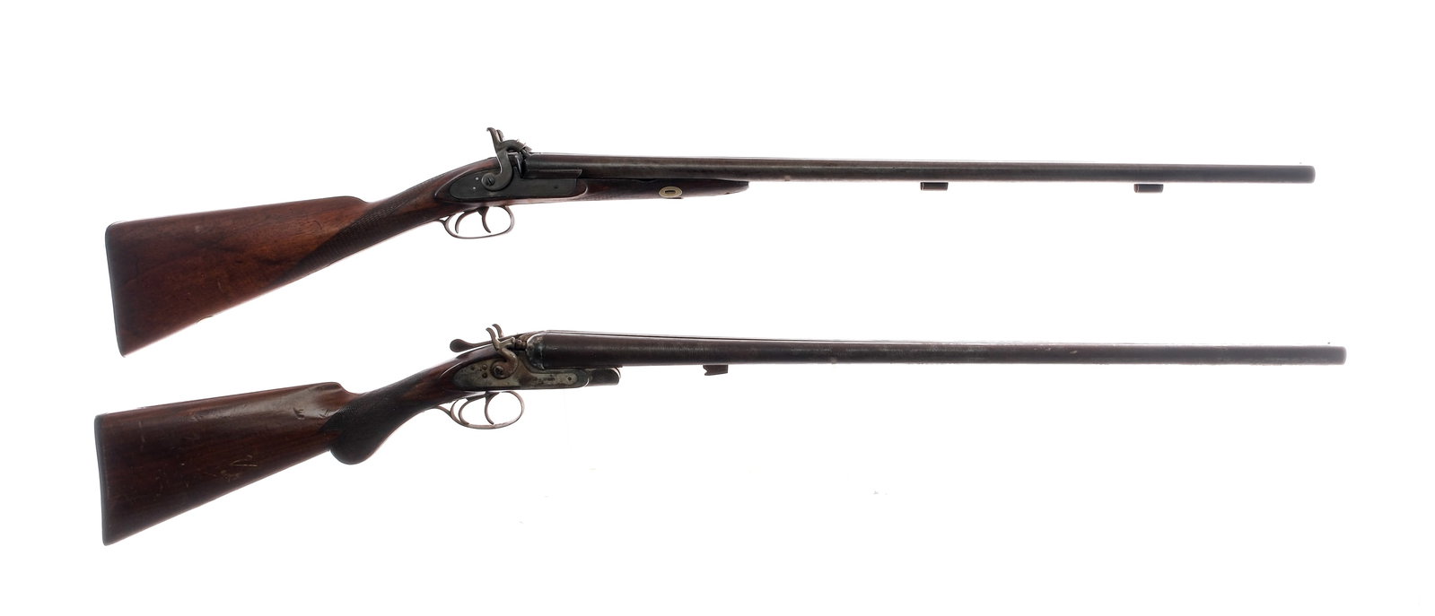 Estate Shotgun Lot 2 Pcs Lot Shotguns: Description Estate shotgun lot with two pieces. The International in 12 gauge with a two round capacity and a 30" laminated steel side by side barrel. Checkered wood stock. Finish worn trigger guard, 