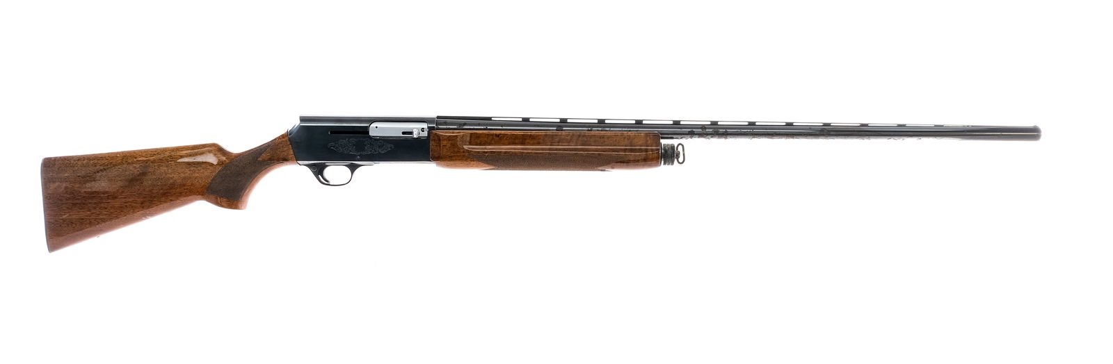 Browning 2000 12Ga Semi Auto Shotgun: Description Browning 2000 chambered in 12 gauge for 3" magnum shells with a integral tube magazine and a 32" vented rib barrel. Blued barrel, magazine tube, engraved receiver, trigger guard, and trigg