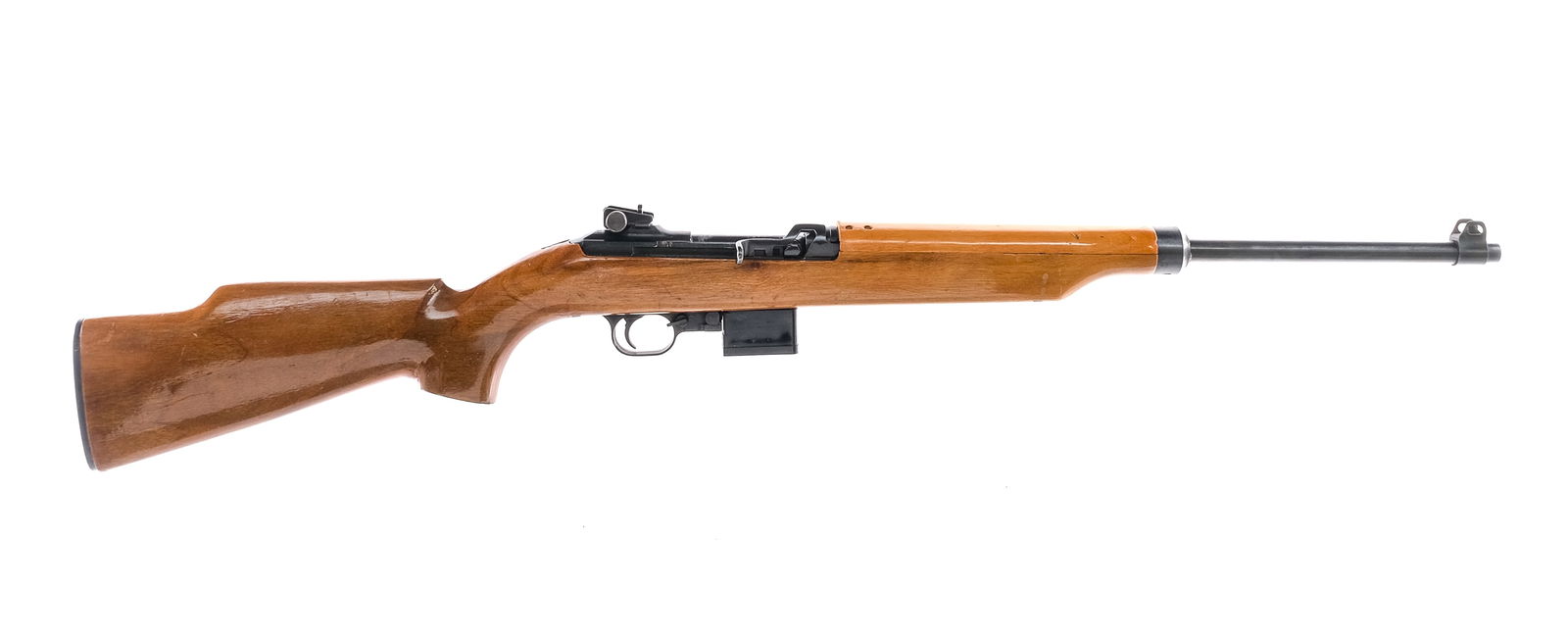 Universal M1 Carbine .30 Semi Auto Rifle: Description Universal M1 Carbine in .30 carbine with one, ten round removable composite magazine and a 18" barrel. Blued metal butt plate. High gloss wood stock and top barrel cover. Blued trigger gua