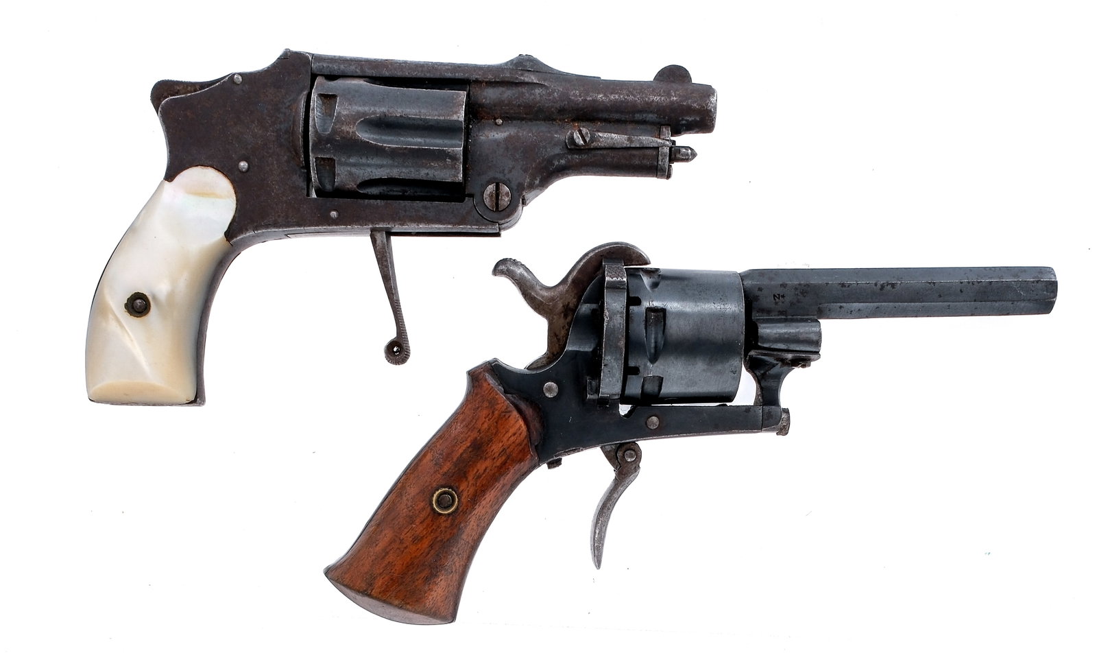 Estate Lot 2 Pcs Revolvers: Description Estate found lot with two revolvers. Velosmith A.G. in 6mm with a six round capacity and a 2.25" barrel. Solid Mother of pearl grip plates. Finish worn, drop trigger, frame, cylinder and b
