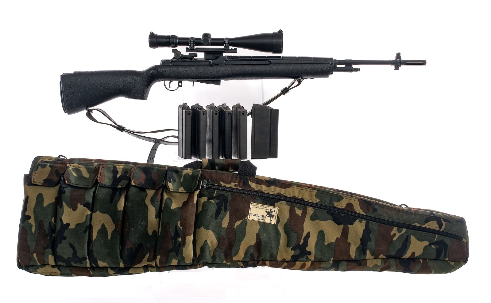 Springfield Armory M1A .308 Semi Auto Rifle: Description Springfield Armory M1A chambered in .308 Winchester with six, twenty round box magazines, one, five round magazine, and a 22" barrel with removable flash hider and bayonet lug. Black/blued